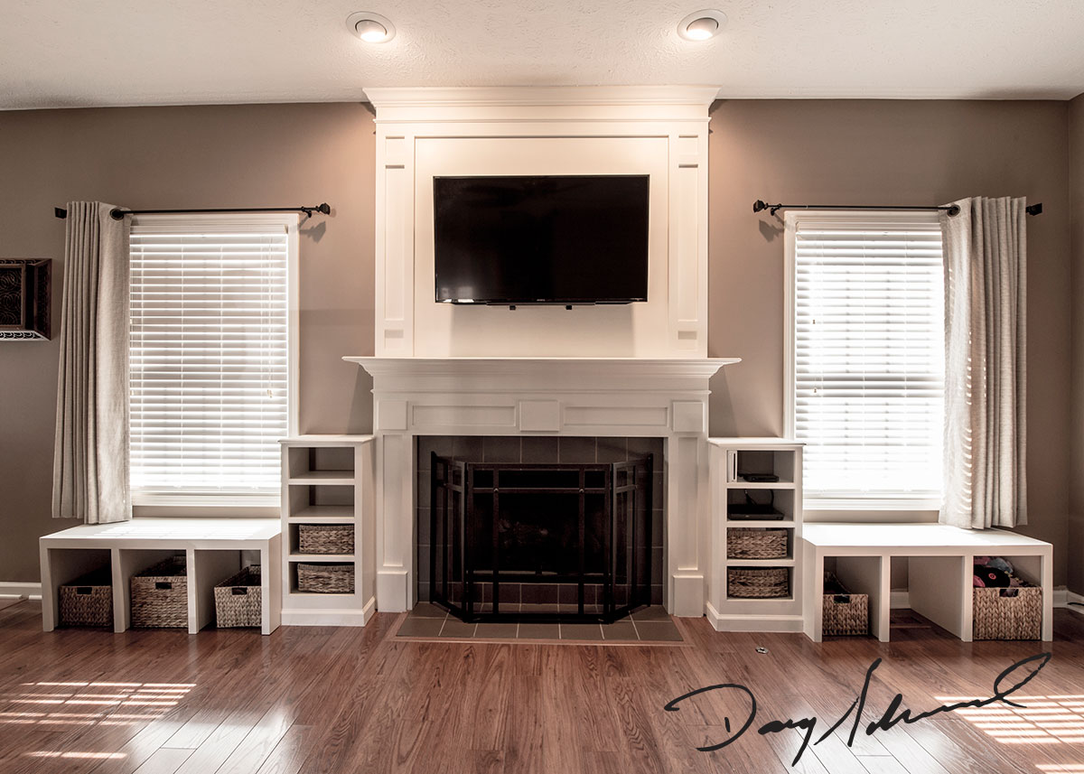 Innovative Fireplace Mantle with wall mounted television and custom storage