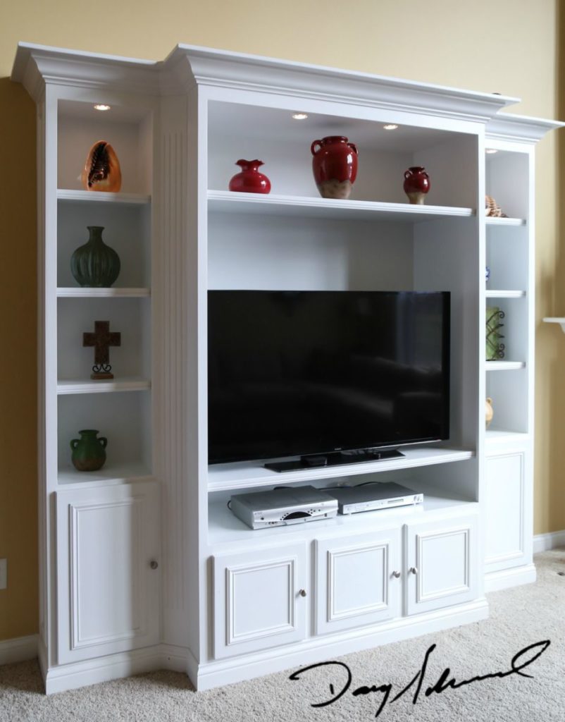 custom cabinetry_white TV cabinet with lighting | Custom woodworker